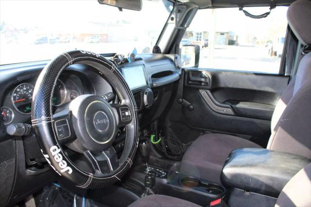 used 2014 Jeep Wrangler Unlimited car, priced at $13,995