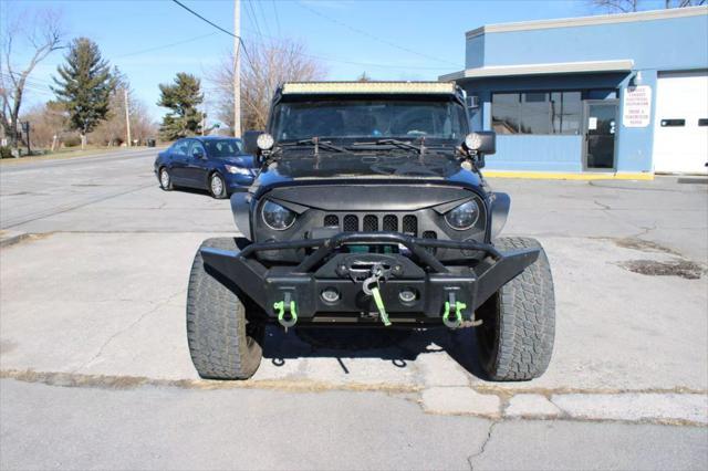 used 2014 Jeep Wrangler Unlimited car, priced at $13,995