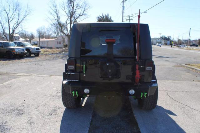 used 2014 Jeep Wrangler Unlimited car, priced at $13,995