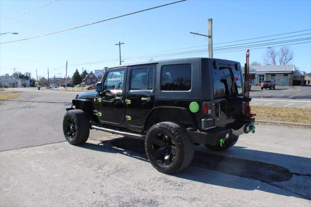 used 2014 Jeep Wrangler Unlimited car, priced at $13,995