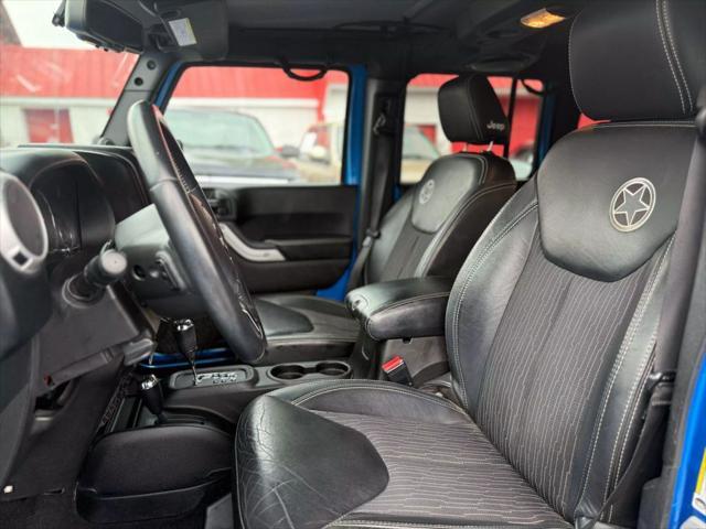used 2014 Jeep Wrangler Unlimited car, priced at $13,995