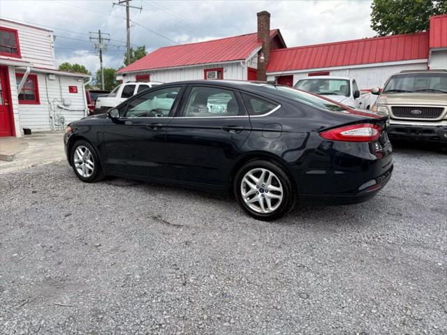 used 2014 Ford Fusion car, priced at $7,995