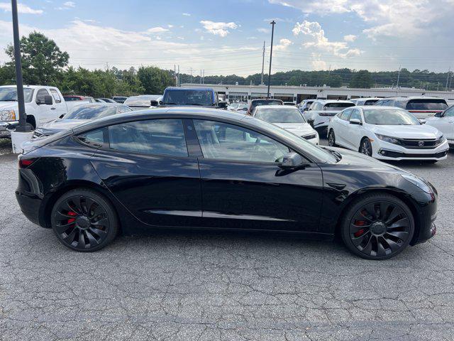 used 2022 Tesla Model 3 car, priced at $29,343