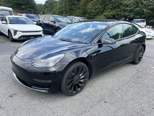 used 2022 Tesla Model 3 car, priced at $29,343