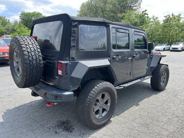used 2017 Jeep Wrangler Unlimited car, priced at $23,628