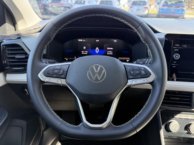 new 2025 Volkswagen Taos car, priced at $27,964