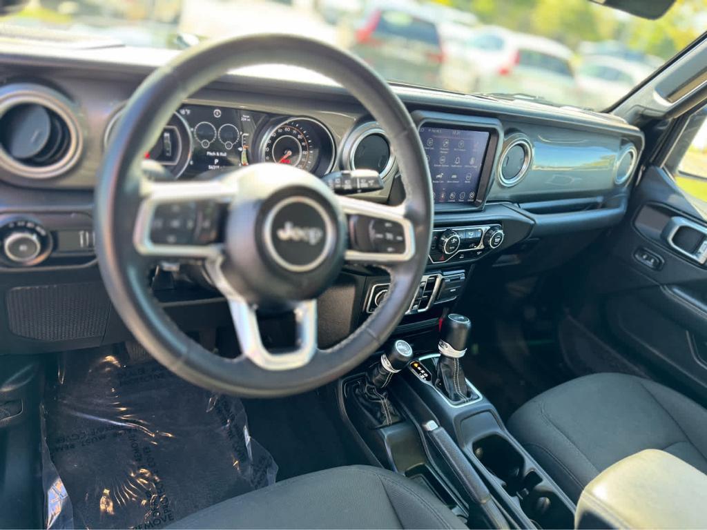 used 2023 Jeep Wrangler car, priced at $34,500
