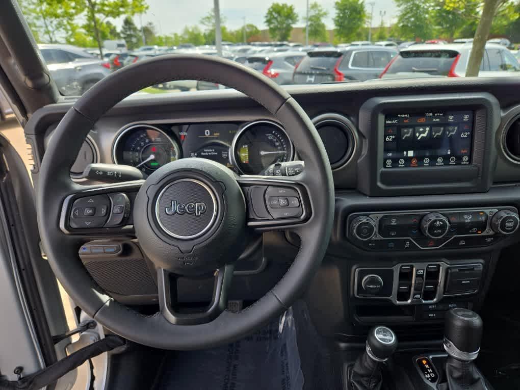used 2023 Jeep Wrangler 4xe car, priced at $29,600