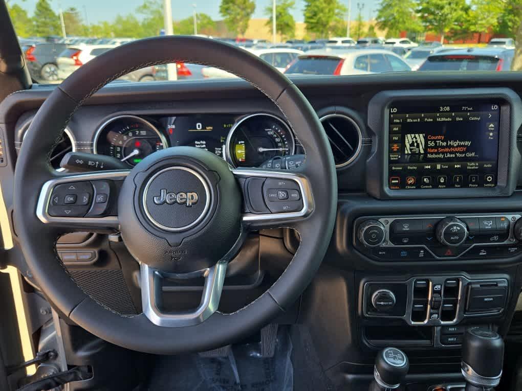 used 2023 Jeep Wrangler 4xe car, priced at $30,900