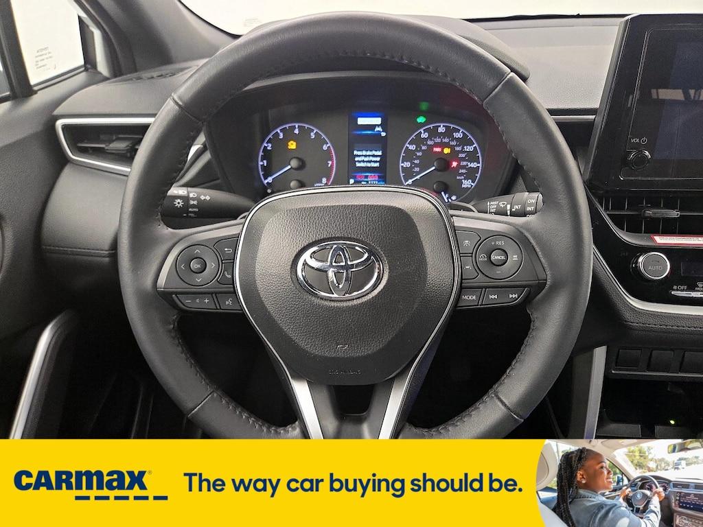 used 2024 Toyota Corolla Cross Hybrid car, priced at $31,998