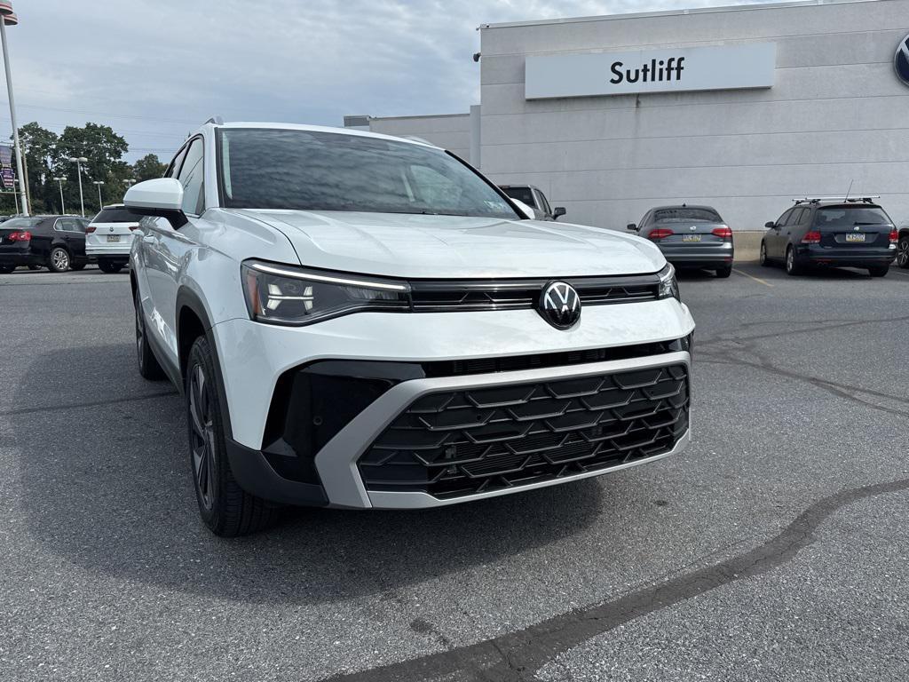 used 2025 Volkswagen Taos car, priced at $25,411