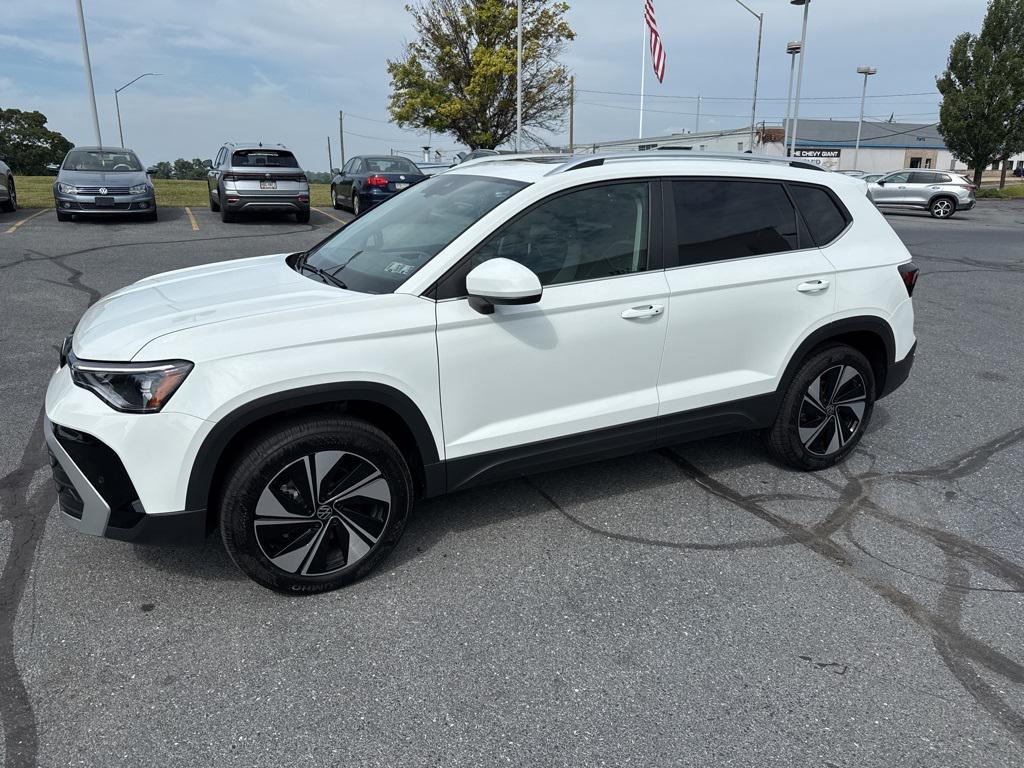 used 2025 Volkswagen Taos car, priced at $25,411