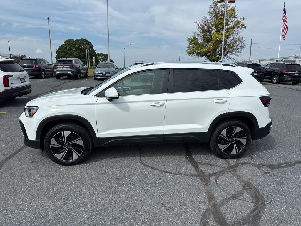 used 2025 Volkswagen Taos car, priced at $25,411