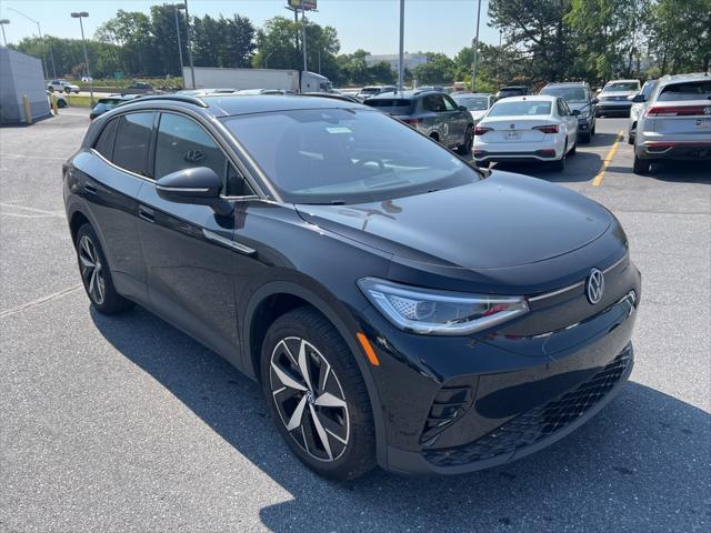 used 2023 Volkswagen ID.4 car, priced at $29,295