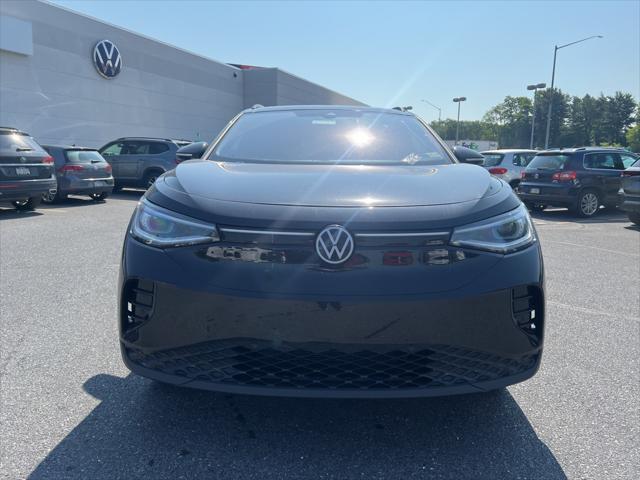 used 2023 Volkswagen ID.4 car, priced at $29,295
