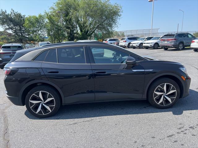 used 2023 Volkswagen ID.4 car, priced at $29,295