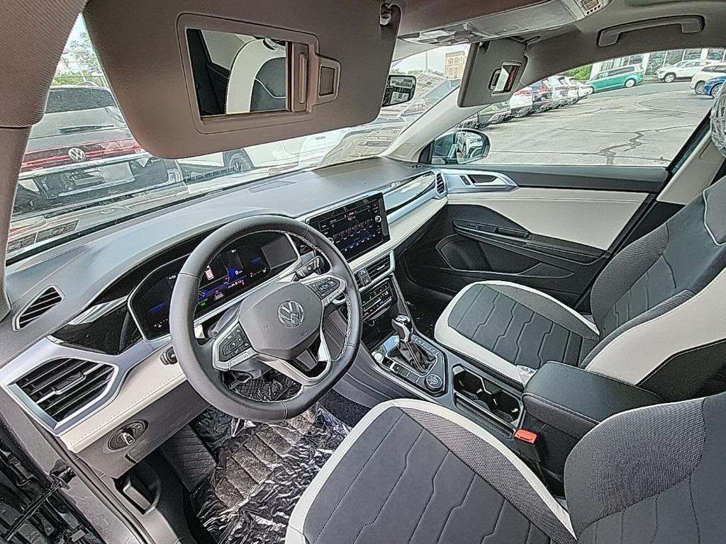 new 2025 Volkswagen Taos car, priced at $30,933