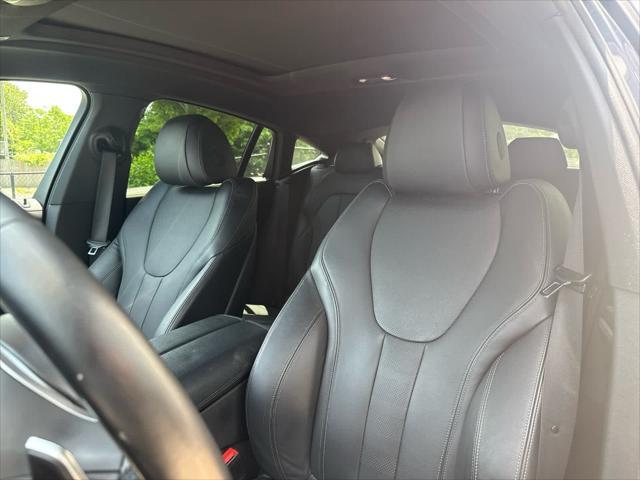 used 2022 BMW X6 car, priced at $56,675