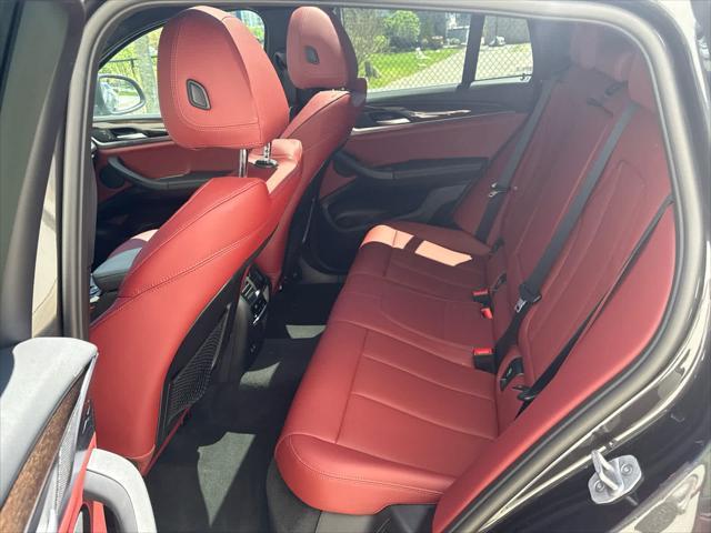 used 2025 BMW X4 car, priced at $55,975