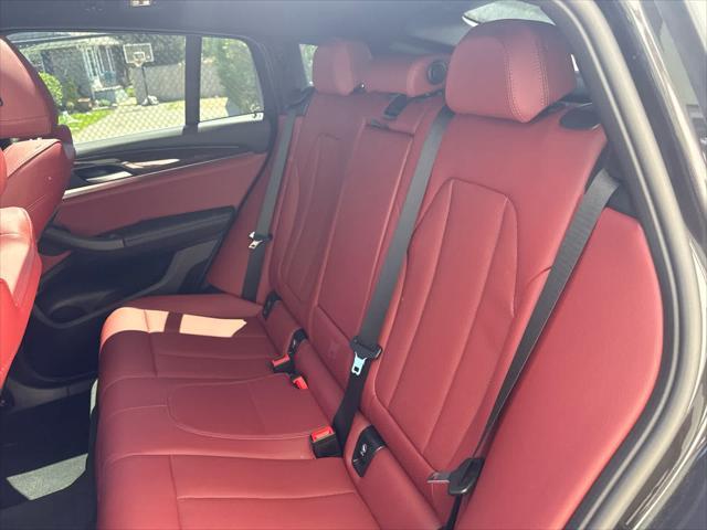used 2025 BMW X4 car, priced at $55,975