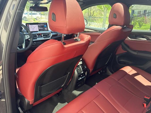 used 2025 BMW X4 car, priced at $55,975