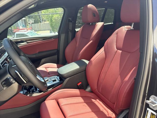 used 2025 BMW X4 car, priced at $55,975