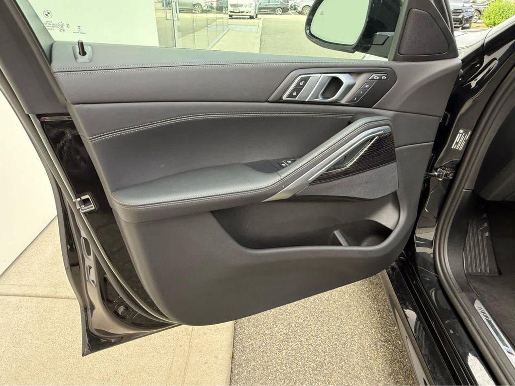 used 2025 BMW X6 car, priced at $65,975