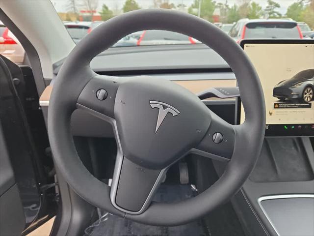 used 2024 Tesla Model Y car, priced at $32,975