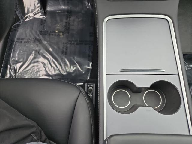 used 2024 Tesla Model Y car, priced at $32,975