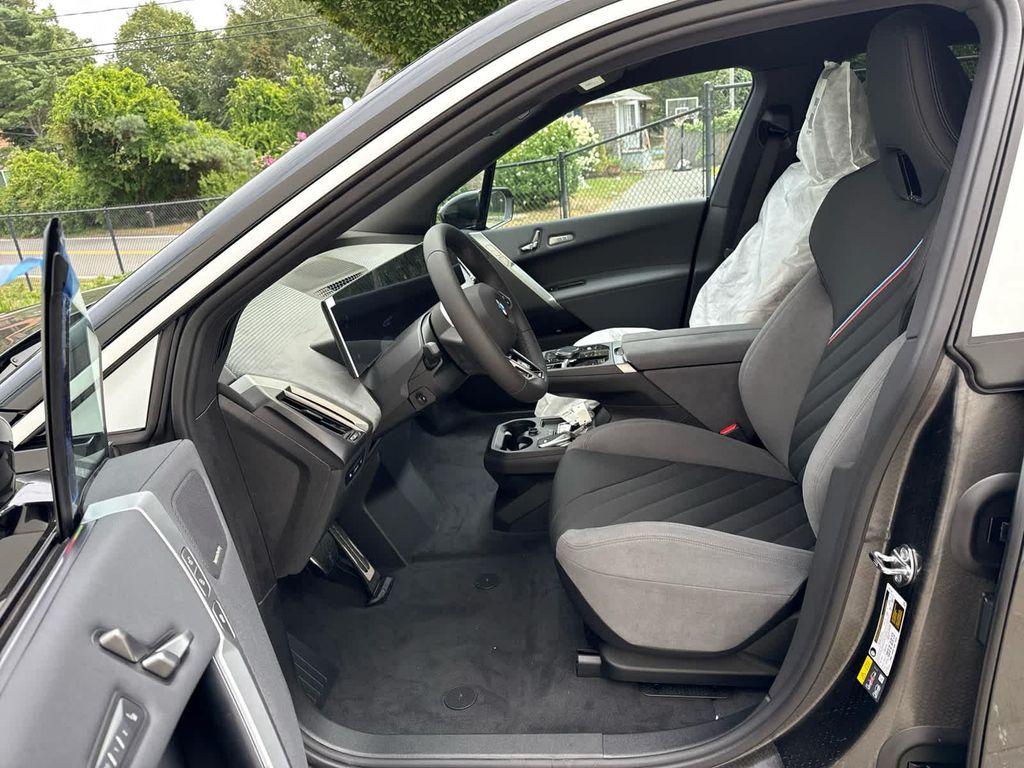 new 2026 BMW iX car, priced at $98,770