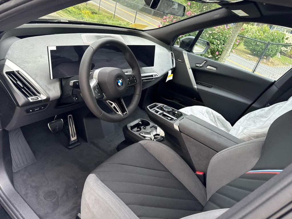 new 2026 BMW iX car, priced at $98,770
