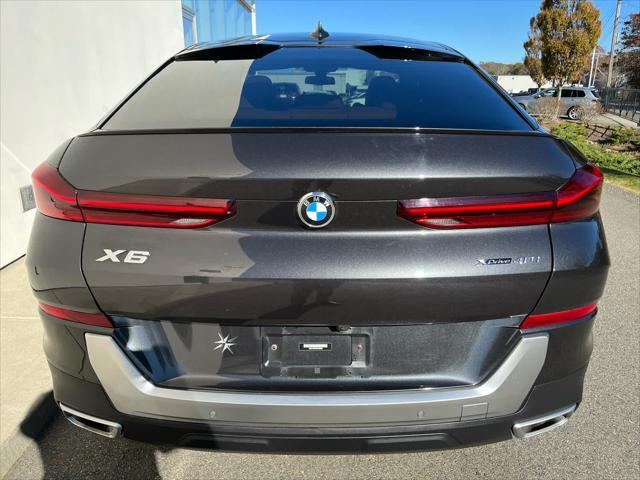 used 2023 BMW X6 car, priced at $58,275