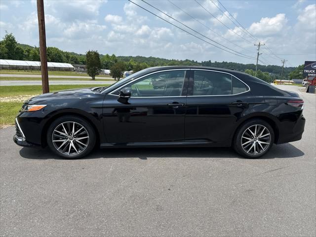 used 2022 Toyota Camry Hybrid car, priced at $36,344
