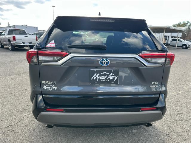 used 2021 Toyota RAV4 Hybrid car, priced at $32,492