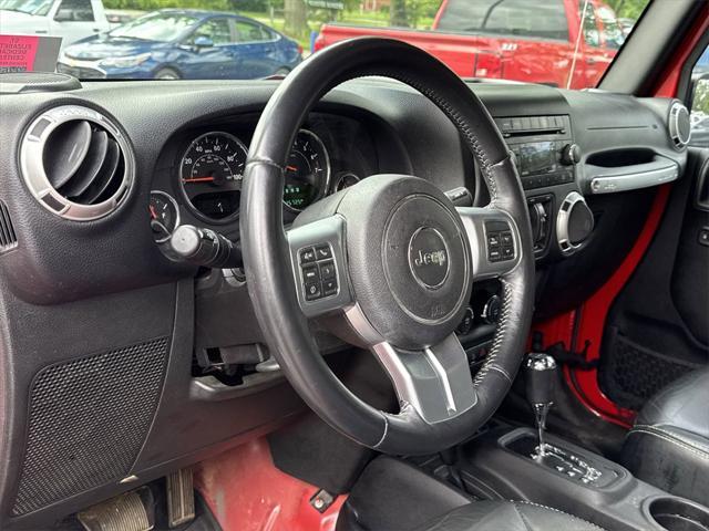 used 2015 Jeep Wrangler Unlimited car, priced at $15,521
