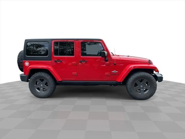 used 2015 Jeep Wrangler Unlimited car, priced at $15,521