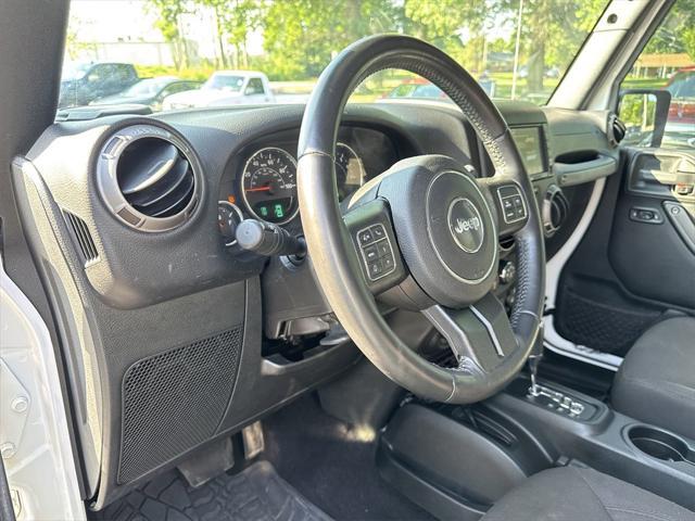 used 2018 Jeep Wrangler JK Unlimited car, priced at $22,343