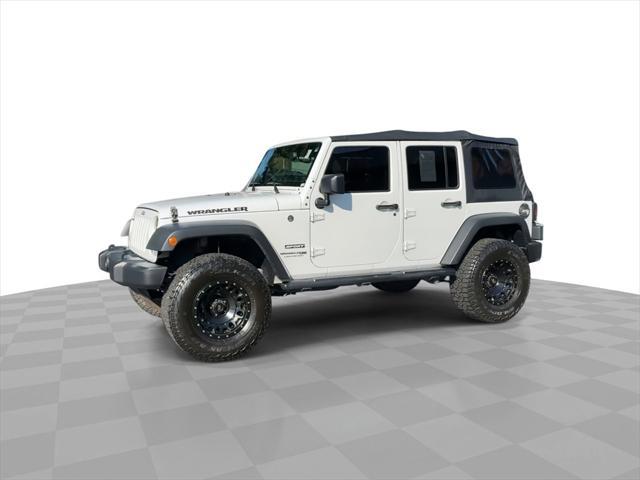 used 2018 Jeep Wrangler JK Unlimited car, priced at $22,343