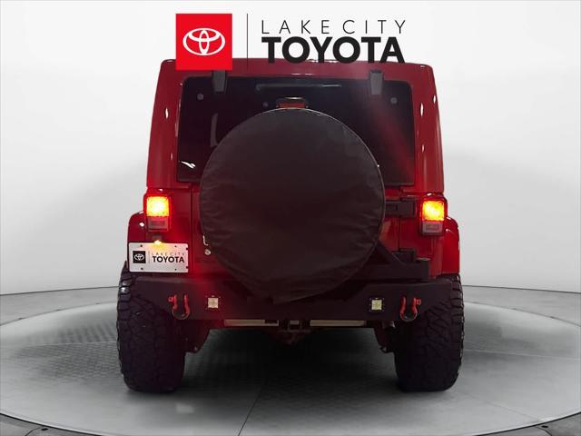 used 2014 Jeep Wrangler Unlimited car, priced at $18,723