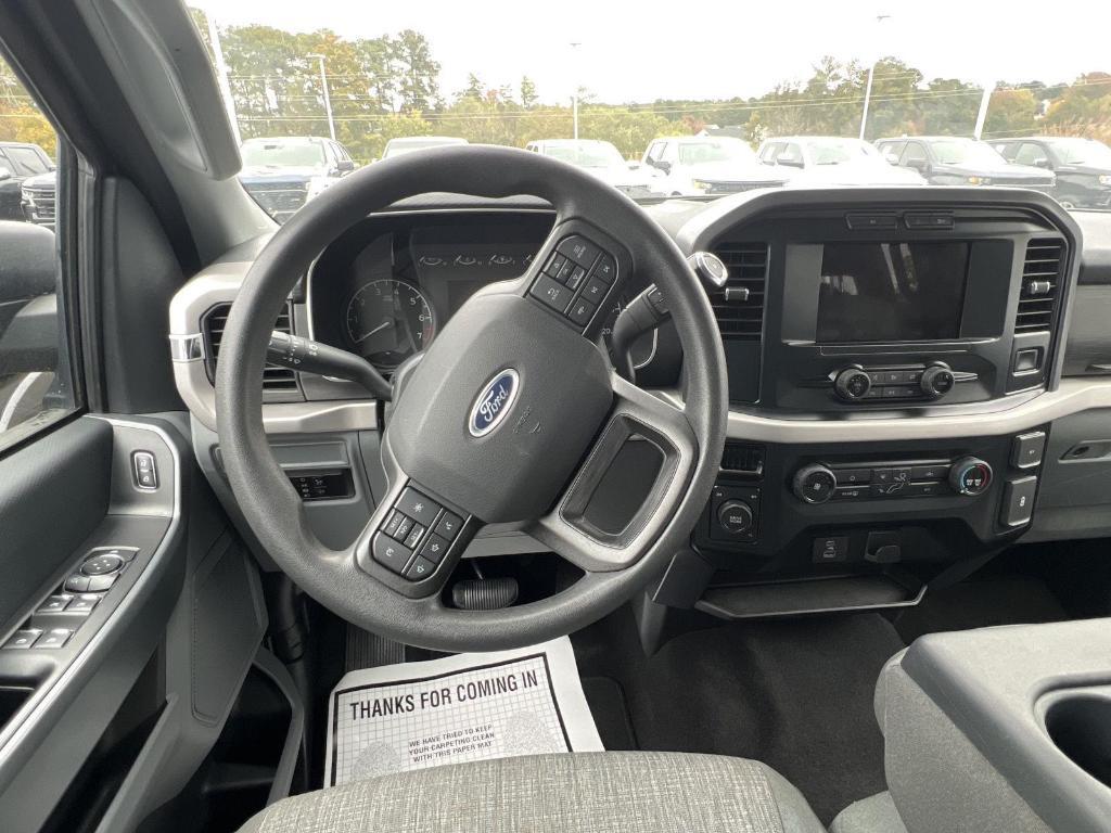 used 2023 Ford F-150 car, priced at $33,991