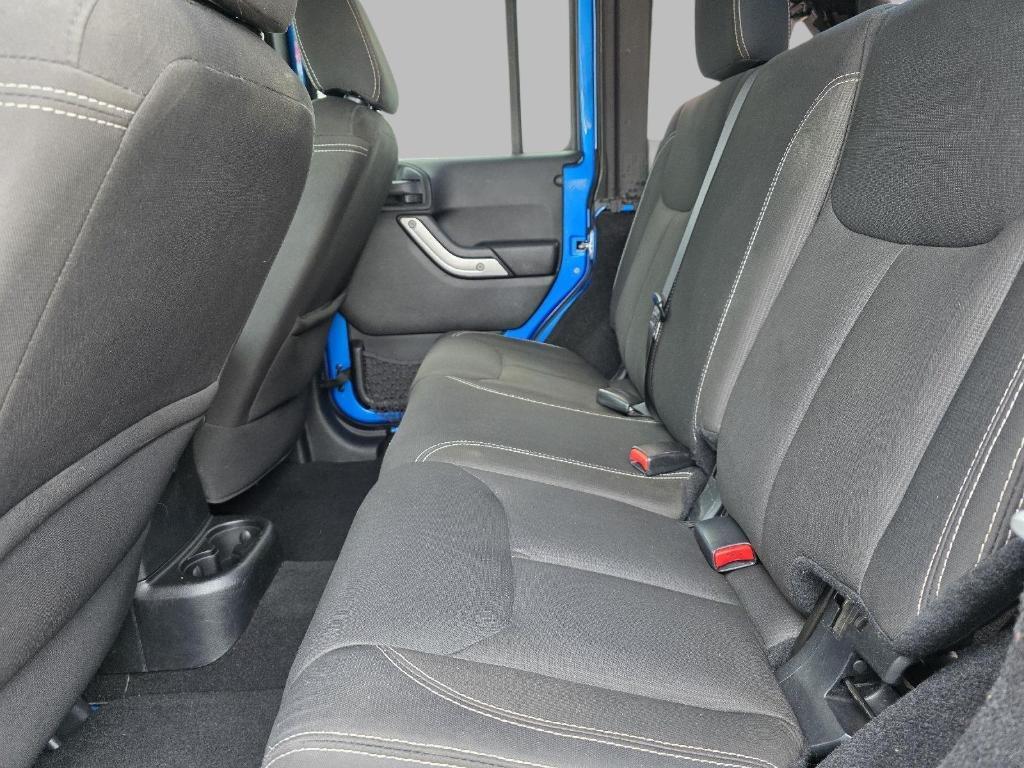 used 2015 Jeep Wrangler Unlimited car, priced at $17,400