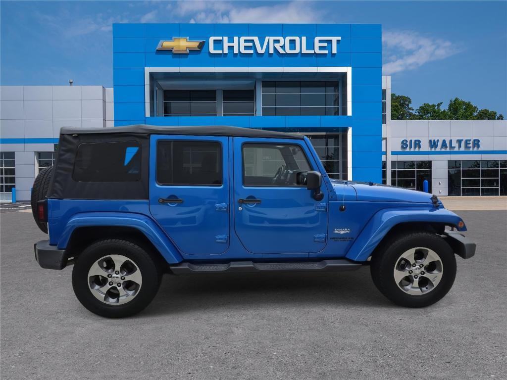 used 2015 Jeep Wrangler Unlimited car, priced at $17,400