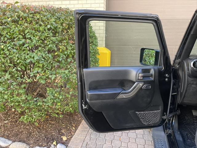 used 2018 Jeep Wrangler JK Unlimited car, priced at $17,395