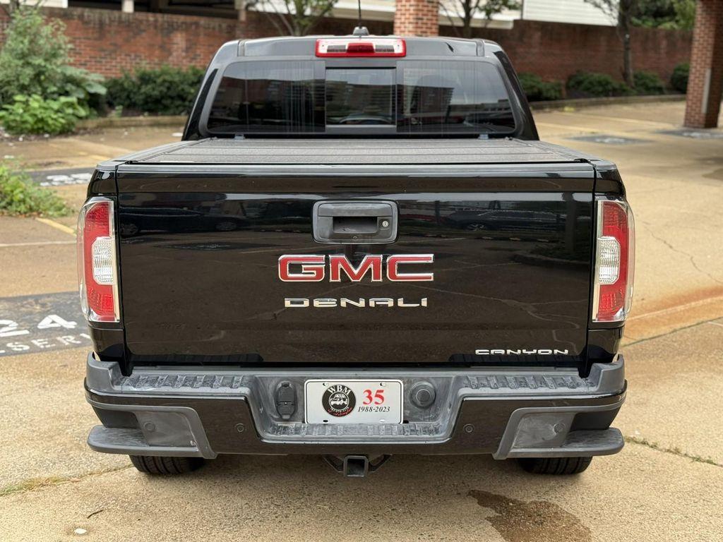 used 2021 GMC Canyon car, priced at $29,895