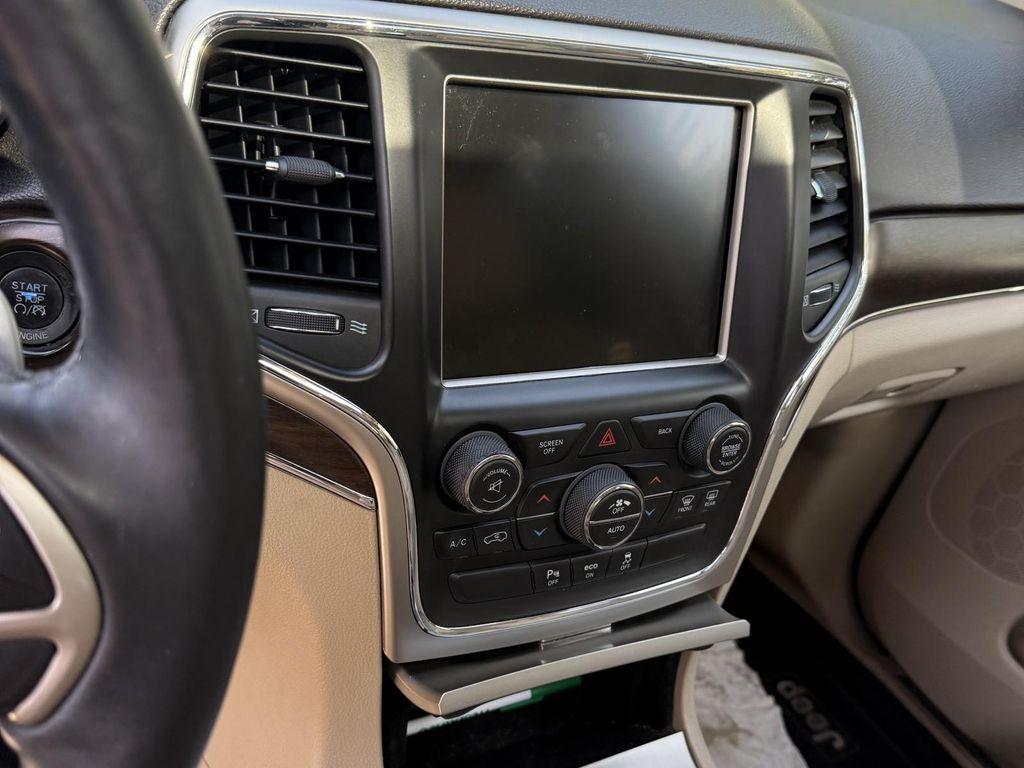 used 2014 Jeep Grand Cherokee car, priced at $11,995