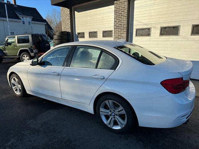 used 2018 BMW 330 car, priced at $16,995