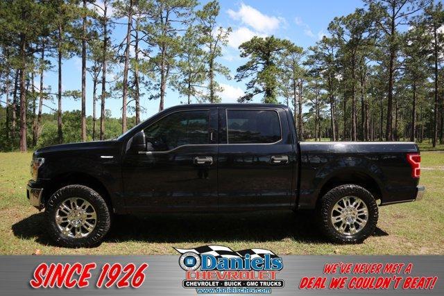used 2018 Ford F-150 car, priced at $26,494