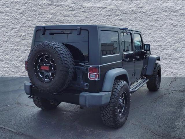 used 2015 Jeep Wrangler Unlimited car, priced at $19,525