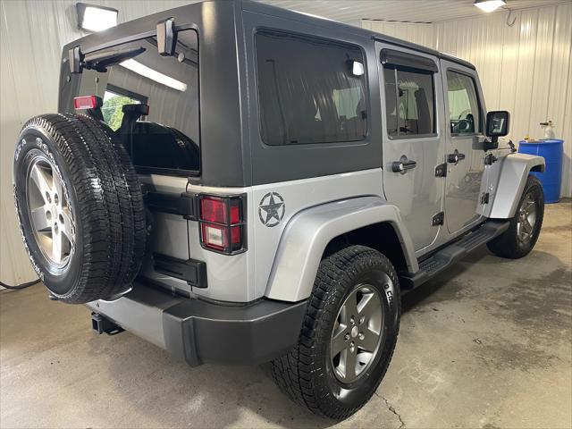 used 2013 Jeep Wrangler Unlimited car, priced at $13,998