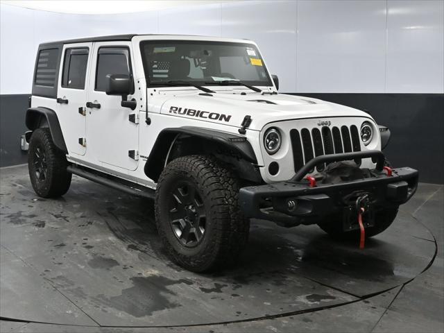 used 2015 Jeep Wrangler Unlimited car, priced at $19,661